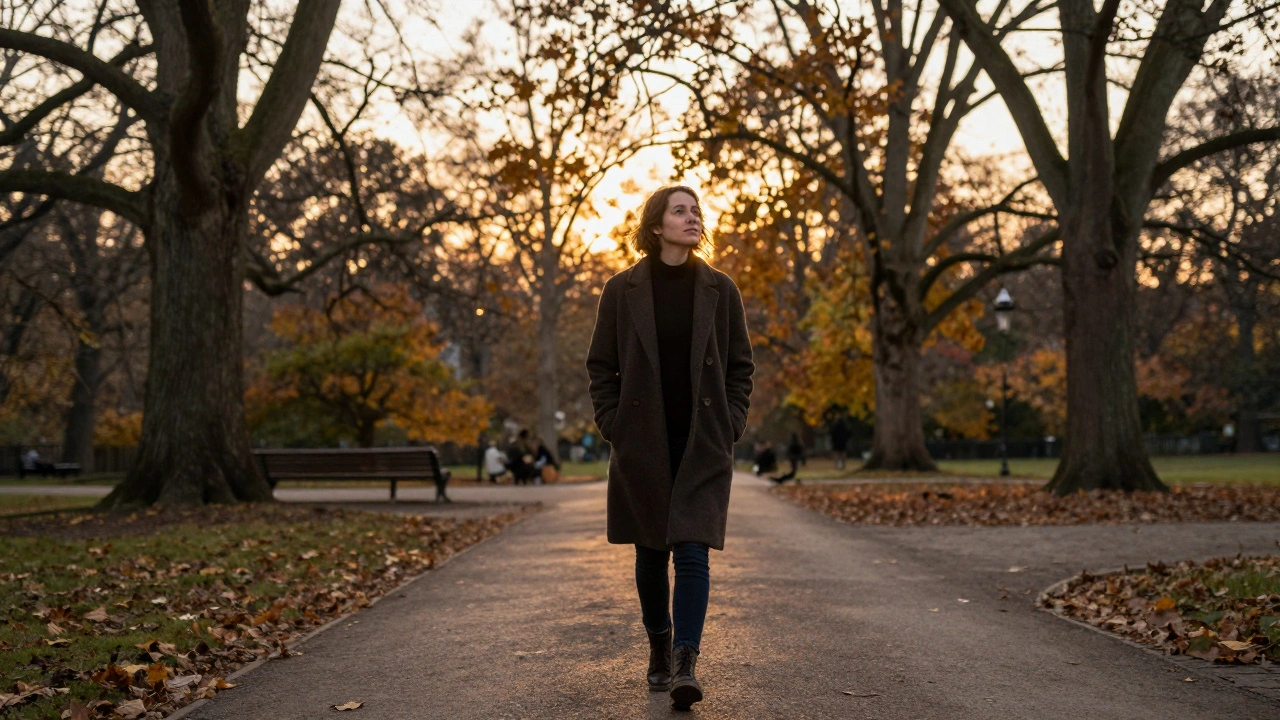 A person walking peacefully in Hyde Park at dusk, symbolizing emotional clarity.