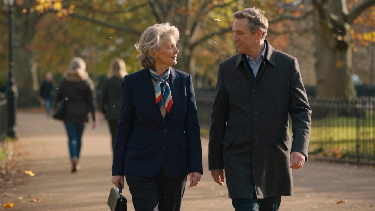 An older woman and man walking peacefully together in Hyde Park.